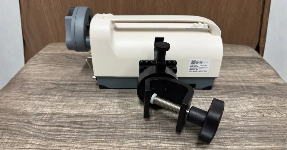 Rear view of a Medfusion 3500 syringe pump with its pole clamp